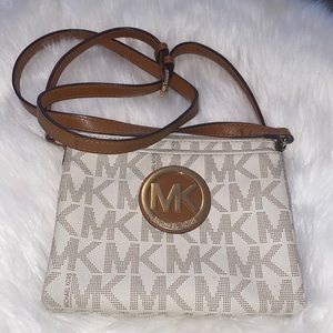 SOLD****michael kors cross body good condition